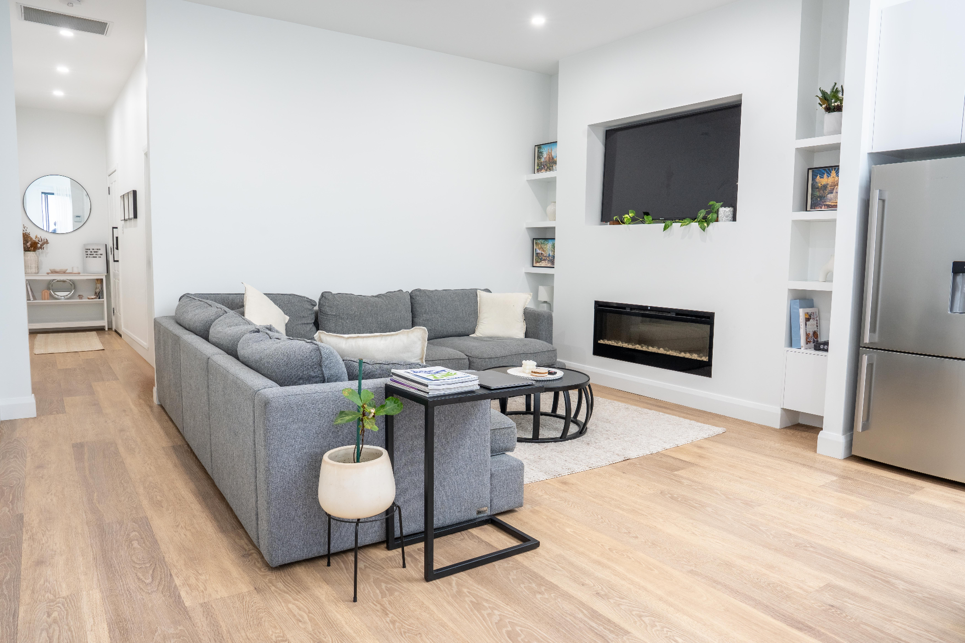 Contemporary living room with fireplace and sectional sofa