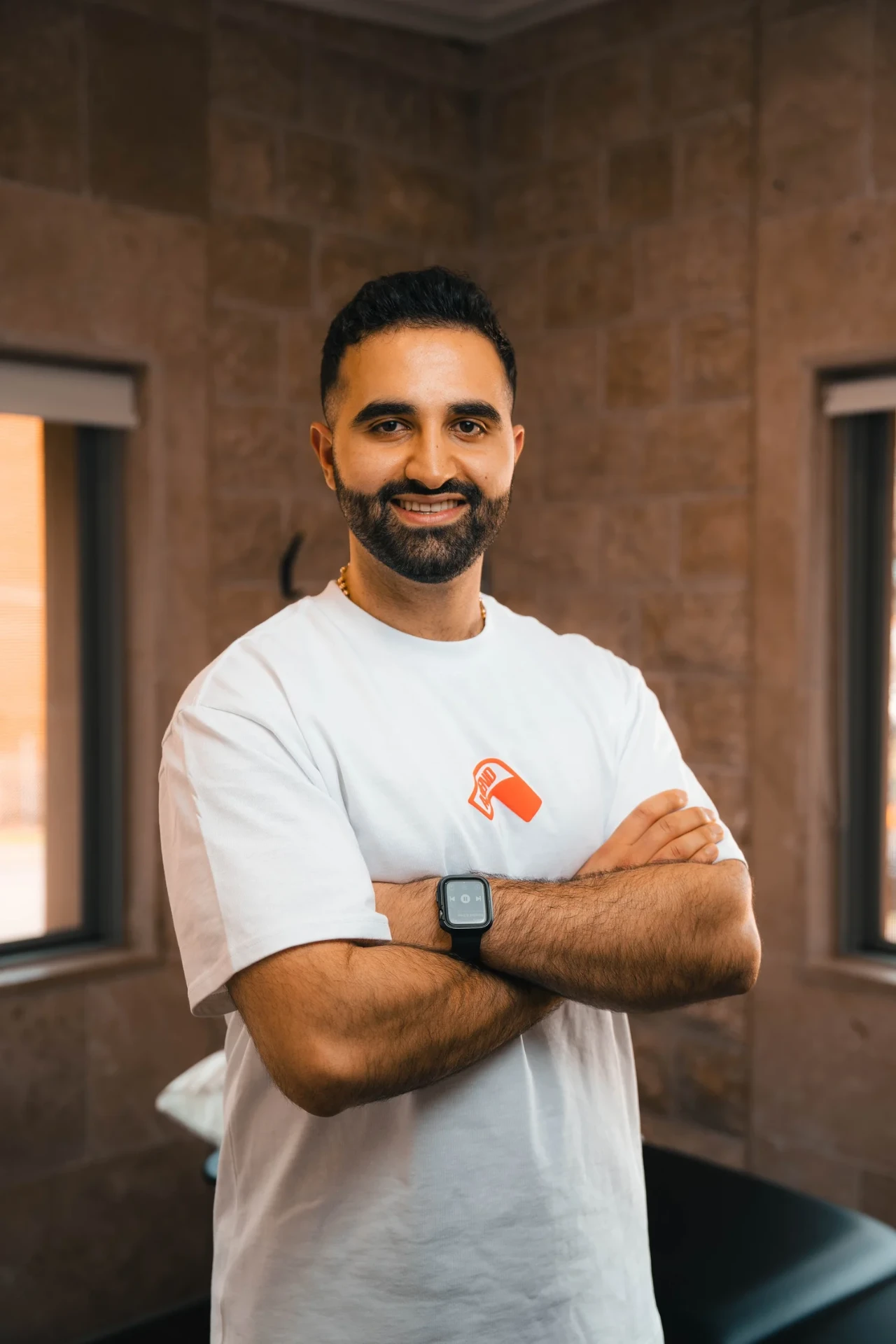 Ascend Sports Rehab practitioner portrait, arms crossed