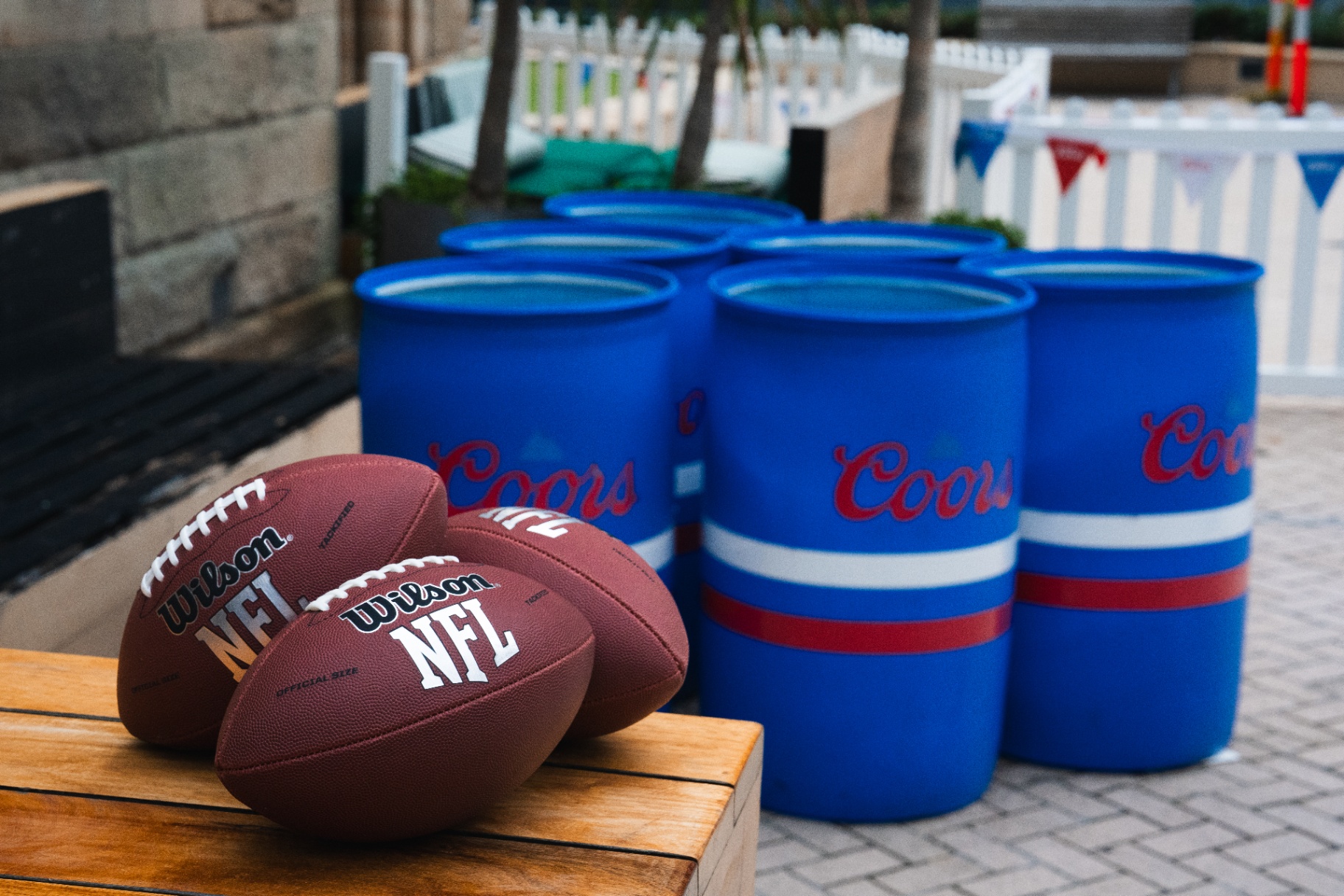 Coors barrels and Wilson NFL footballs at Super Bowl activation